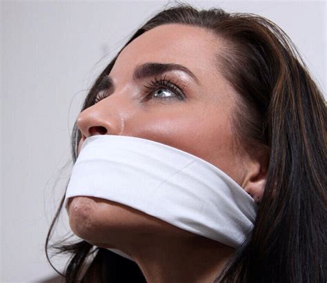 Woman with a band over her mouth; Submissive