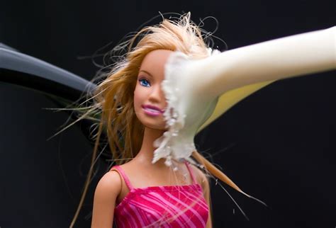 Barbie having milk poured on her; Trans Dominant